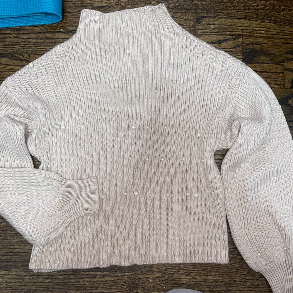 Light pink turtleneck with small pearls on it. Soft & comfy